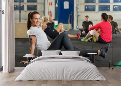 Portrait Of Woman Exercising In Cross Fitness Box Wall mural