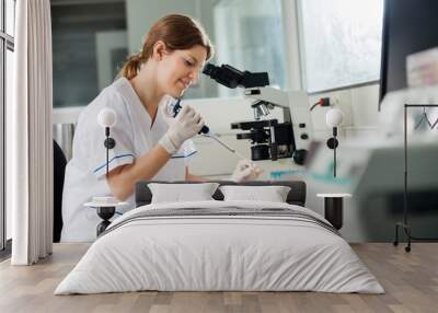 researcher using pipette in laboratory Wall mural