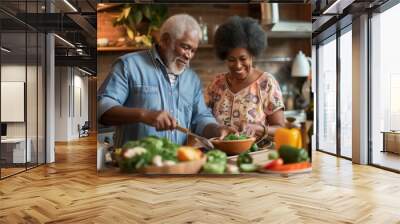 Senior happy smiling african american couple enjoying and cooking healthy dinner together on kitchen at home Wall mural