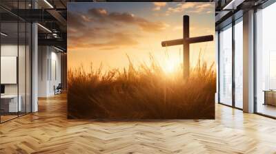 Silhouette christian cross on grass in sunrise background Wall mural