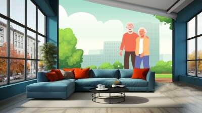 cute elderly couple is walking in a city park. happy seniors actively spend time outdoors Wall mural