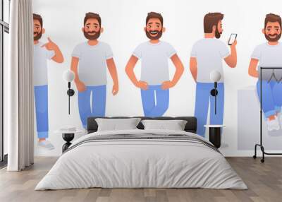 Happy man character set. Guy dressed in a white T shirt and jeans poses, points to himself, walks, holds a phone Wall mural