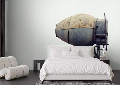 Minimalist close-up of a cement mixer against a simple, light background, no other elements visible. Wall mural