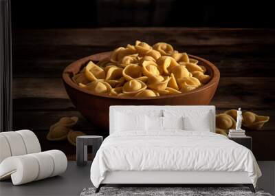 Orecchiette pasta in a bowl on wooden background Wall mural