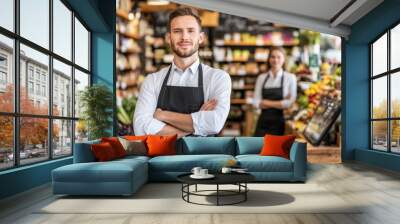 A portrait of a young man in the Zero Waste Shop in a grocery store. He has a conscious minimalism approach to life without plastic. Wall mural