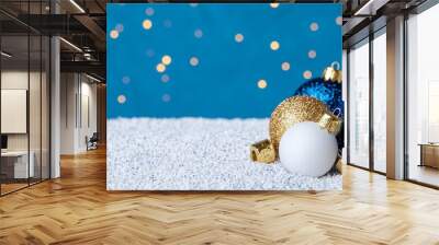 Blue blurry background wallpaper with copy space. Blue Christmas glitter design background. Wall mural