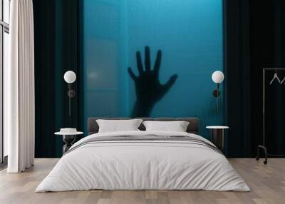 In black, a creepy man holds the frosted glass with one hand. Wall mural