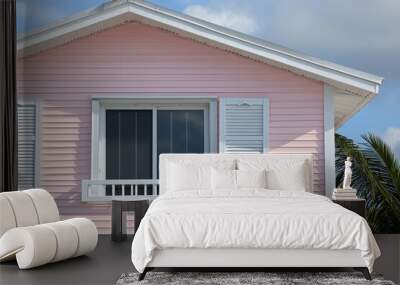 View of wooden house tower by the beach on a cloudy day in Seaside, Florida - a new urbanism pastel pink architecture design Wall mural