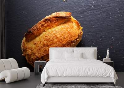 Food concept Artisan crusty cornbread on black background with copy space Wall mural