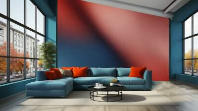 Abstract red-to-blue gradient background featuring a subtle grain texture. Wall mural