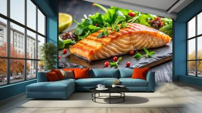 Grilled salmon fish fillet with green salad on black cutting board, close up, salmon, fish, fillet, grilled, green salad Wall mural