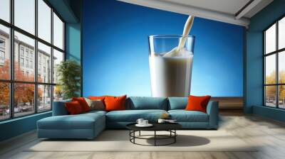 Milk pouring into a clear glass , dairy, liquid, drink,pouring, flow, fresh, white, refreshment, glassware, healthy Wall mural