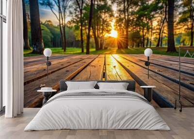 Plank floor in a park at sunset with wooden planks and forest debris, sunset, park, wooden planks, background, nature, outdoor Wall mural