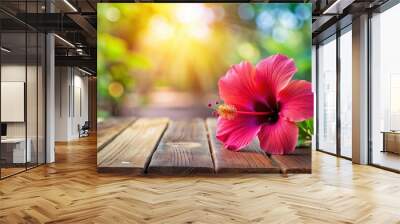 Vibrant hibiscus flower on wooden table with blurred background, hibiscus, flower, wooden, table, blur, background, gentle, nature Wall mural