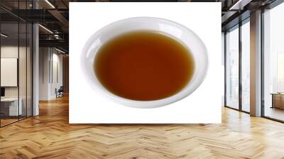 Fish sauce in white bowl isolated on background Wall mural