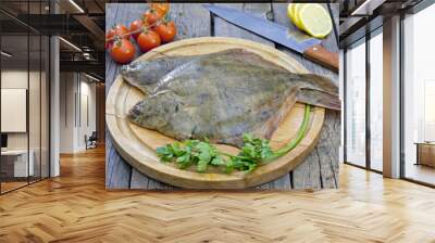 Flounder raw fish on cutting board in kitchen Wall mural