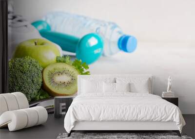 Healthy diet and sport concept with food and gym accessories Wall mural