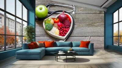 Healthy food in heart and cholesterol diet concept on vintage boards
 Wall mural