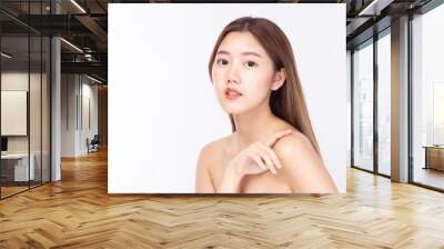 Beautiful Spa Asian model girl with perfect fresh clean skin. Beautiful Asian woman beauty female model looking at camera and smiling beauty and spa concept isolated on white background. Wall mural