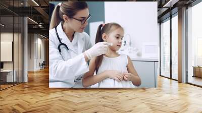 A doctor injects a vaccine into a child's thigh. Wall mural