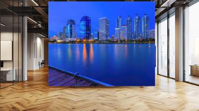 modern buildings of Bangkok night city skyline, Thailand. Cityscape photography of Benchakitti Park at dusk. Bangkok night city downtown. Modern night city skyline with lights reflection, Asia Wall mural