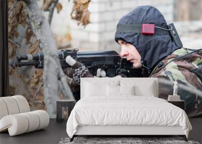 soldier in camouflage uniform Wall mural