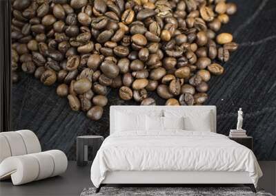 Coffee beans on a background of black wood Wall mural