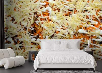 Pieces of fresh meat with cheese and mayonnaise on a baking sheet. Wall mural