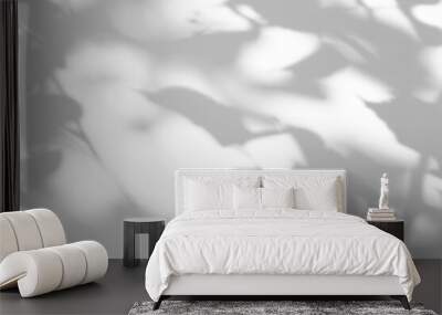 Shadow overlay effect for photo. Shadows from tree leaves and tropical branches on a white wall in sunlight. Wall mural