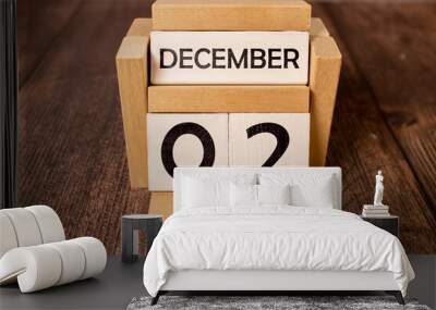 December 2 text on wooden blocks with blurred nature background. Calendar concept. Wall mural