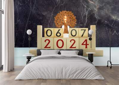 July 6 calendar date text on wooden blocks with blurred background park. Wall mural