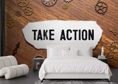 notepad on the desktop. text Take action Wall mural