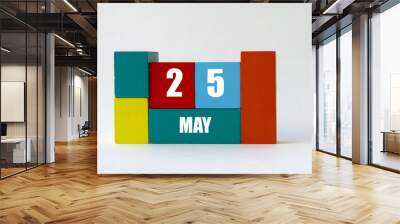 Day of month. Cube Calendar on multi-colored cubes on white background Wall mural