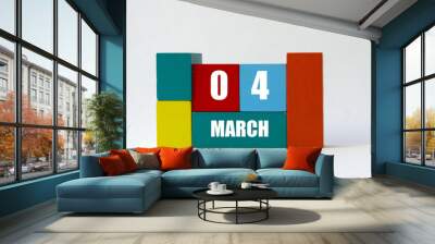 Day of month. Cube Calendar on multi-colored cubes on white background Wall mural