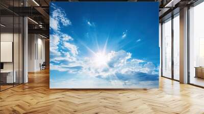 blue sky with clouds and sun reflection.The sun shines bright in the daytime in summer Wall mural