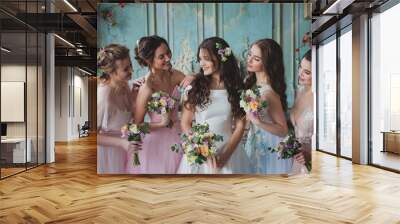 Beautiful young woman bride with friends. A wedding celebration Wall mural