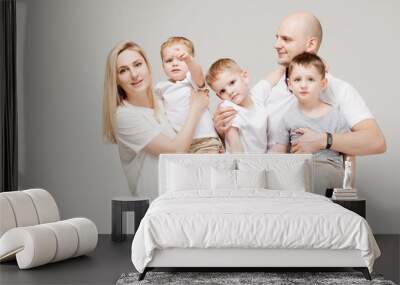 Big and cheerful family, mom dad and three sons. Happy together Wall mural