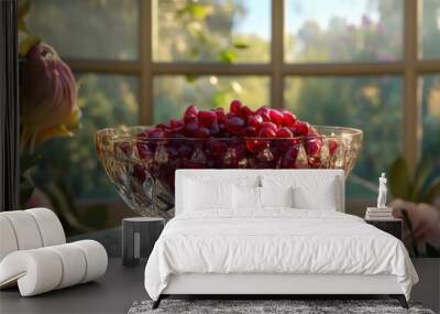 Pomegranate seeds in a crystal bowl, with a luxurious villa and garden visible through the windows Wall mural