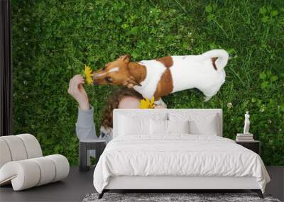 Little girl enjoy playing with her puppy dog Wall mural