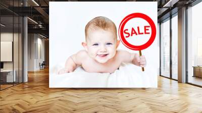 Smart little boy holding a sign 