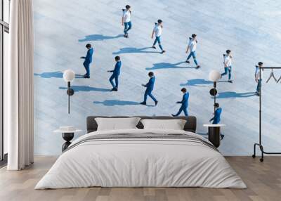 top aerial view man people with face mask walk on pedestrian concrete with silhouette shadow, concept of social new normal life of pattern one man walking. Post production one man in many position. Wall mural