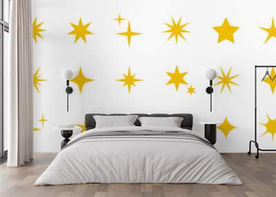 Vector yellow and gold stars sparkles icons. Collection of yellow star signs. Decoration twinkle, shiny flash. Gold glowing light stars and bursts isolated on white. Wall mural