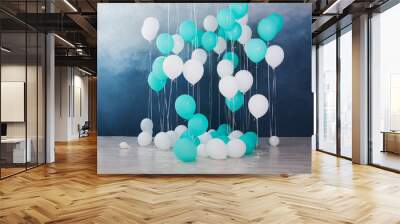 balloons on dark blue wall background. Colorful balloons in room prepared for birthday party. Wall mural