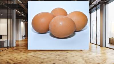 Free-range chicken eggs on a white background close-up Wall mural