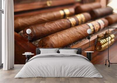 A premium cigar humidor with a collection of fine cigars, displayed on a polished wooden surface. Wall mural