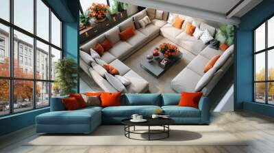 Modern living room with two sectional couches, a minimalist coffee table, and a mix of potted flowers and plants adding a natural touch. Wall mural