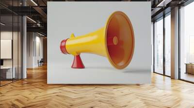 Colorful yellow and red megaphone isolated on a light background, emphasizing communication and announcement. Wall mural