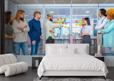 Coworkers working with colorful adhesive notes with ideas Wall mural