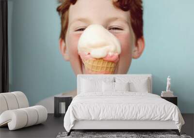 A sweet little child enjoying the summer sun, a delicious dessert, a melting ice cream cone. Summer refreshment and snacks on the beach. Generative AI. Wall mural