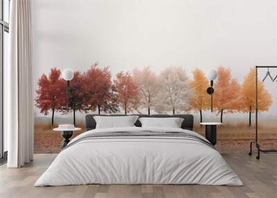 Gentle minimal autumn landscape, a tree that is in the fog, whose leaves of warm red and yellow colors are slowly falling. Change of seasons. Wall mural